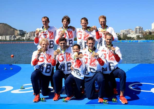 Great Britain's Scott Durant, Tom Ransley, Matt Gotrel, Paul Bennett, Matt Langridge, William Satch, cox Phelan Hill, Andrew Triggs Hodge and Pete Reed celebrate with their Gold Medals in the Men's Eight final on the eighth day of the Rio Olympics Games, Brazil.