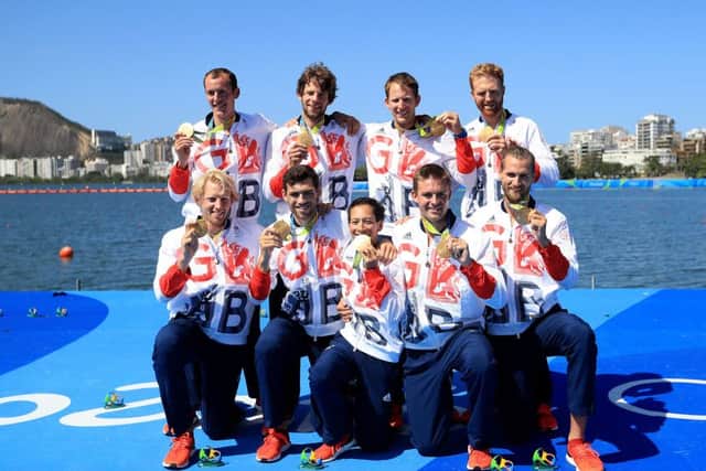 Great Britain's Scott Durant, Tom Ransley, Matt Gotrel, Paul Bennett, Matt Langridge, William Satch, cox Phelan Hill, Andrew Triggs Hodge and Pete Reed celebrate with their Gold Medals in the Men's Eight. Picture: Mike Egerton/PA