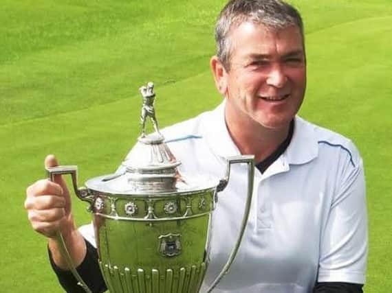 Garry Houston with the Leeds Cup after his win last year at Moortown.