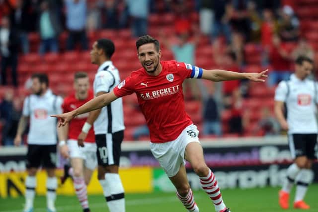 Barnsley's Conor Hourihane celebrates scoring his team's first goal against Derby County. Picture : Jonathan Gawthorpe