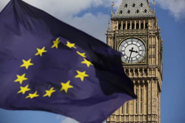 File photo dated of a European Union flag in front of the Palace of Westminster Photo: Daniel Leal-Olivas/PA Wire