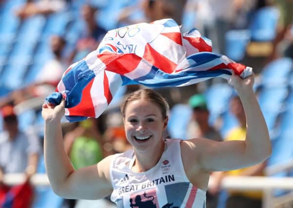 Burnley's Sophie Hitchon celebrates after winning the bronze medal in the women's hammer throw final.
