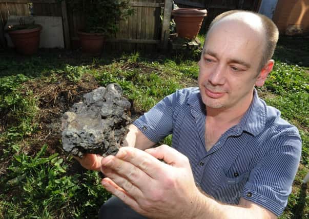 Meteorite mystery: David Stevenson with the rock