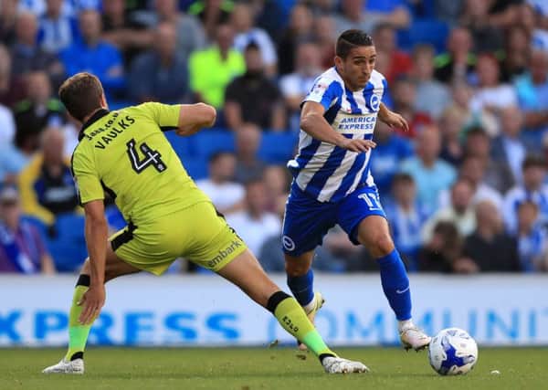 Brighton and Hove Albion's Anthony Knockaert (right) battles for possession of the ball with Rotherham United's Will Vaulks (left)..