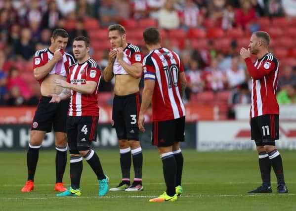 Sheffield Utd players seem shell-shocked after the third first-half goal against Southend United. Picture: Simon Bellis/Sportimage.