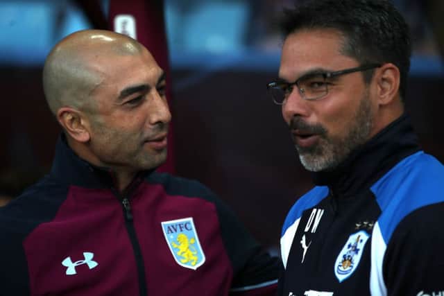 Aston Villa manager Roberto Di Matteo (left) and Huddersfield Town manager David Wagner at Villa Park. Picture: Nick Potts/PA.