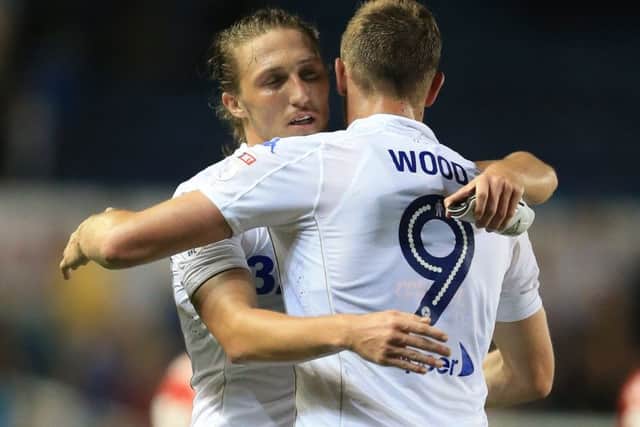 Leeds United's Chris Wood is congratulated by Luke Ayling  after the game against Fulham