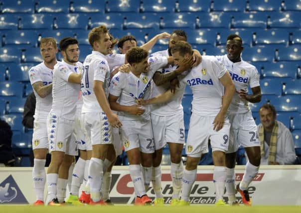 Leeds celebrate Chris Wood's equaliser from a spectacular overhead kick.
 (Picture: Bruce Rollinson)