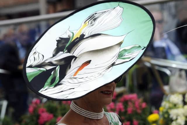 One of the fabulous hats sported by a spectator.
