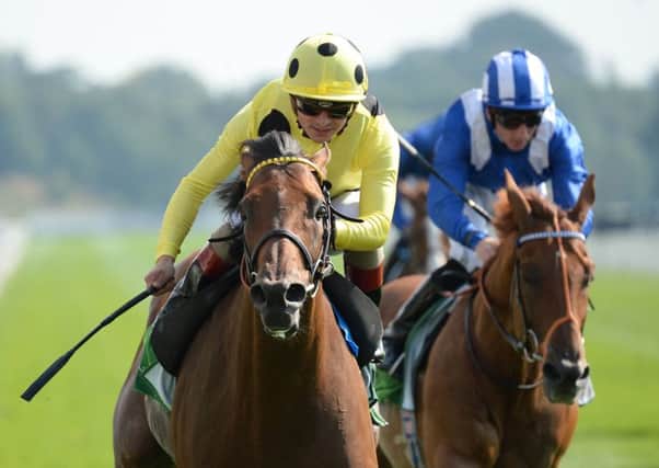 Postponed ridden by Andrea Atzeni wins the Juddmonte International Stakes.