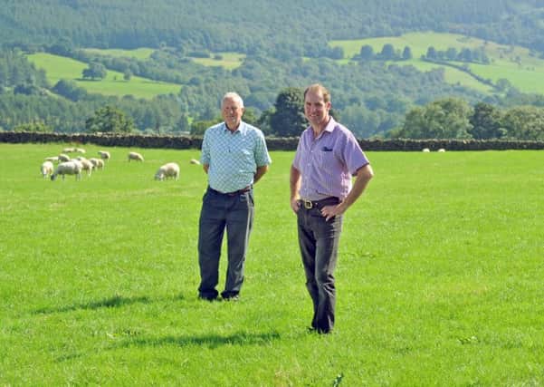 Dennis Easton at Low Ewe Cote Farm at Laskill in Bilsdale with Dave Sanderson, Bilsdale show chairman. Picture Tony Johnson.