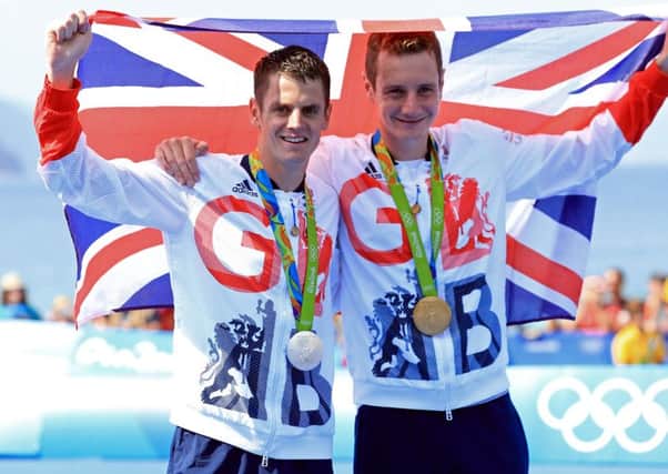 On top of the world - Alistair and Jonny Brownlee after winnnig Olympic gold and silver in the triathlon.