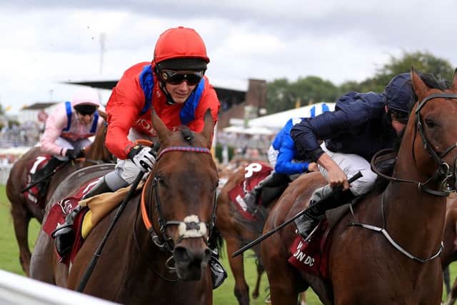 IN THE RUNNING: Take Cover and jockey David Allen on their way to winning the Qatar King George Stakes during day four of The Goodwood Festival last month. Picture: John Walton/PA
