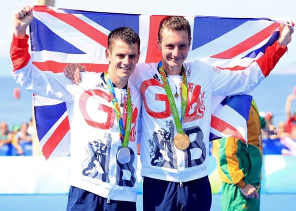Leeds' Alistair and Jonny Brownlee with their Gold and Silver medals for the Men's Triathlon at Fort Copacabana in Rio . Picture: Mike Egerton/PA.