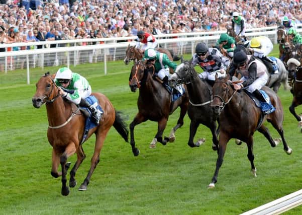Firmament ridden by Daniel Tudhope wins the Clipper Logistics Stakes during day two of the Ebor Festival. Picture: Anna Gowthorpe/PA