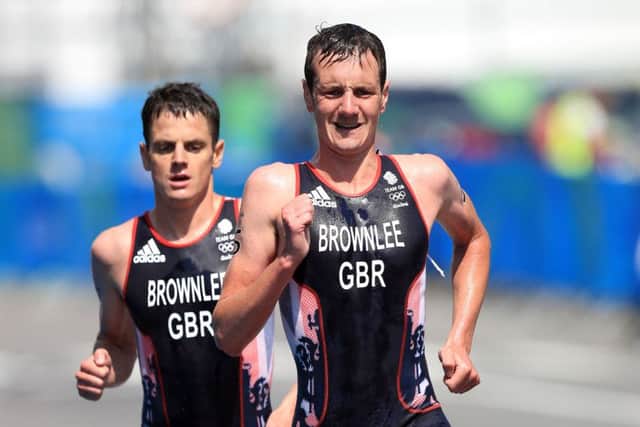 Great Britain's Alistair Brownlee leads from brother Jonny during the running section of the Men's Triathlon. Picture: Mike Egerton/PA.