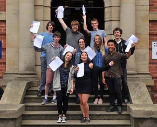 18 August 2016 .......  Students receive their A Levels results at Roundhay School, Leeds. Picture Tony Johnson
