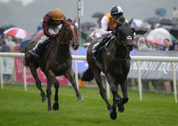 Quest For More ridden by George Baker (right) wins the Weatherbys Hamilton Lonsdale Cup during day three of the 2016 Yorkshire Ebor Festival at York Racecourse.