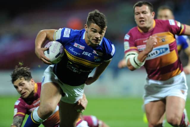 HAPPY DAYS: Stevie Ward scores a try against Huddersfield Giants - the same night he ruptured his cruciate ligament and that Leeds Rhinos clinched the League Leaders' Shield through a late, late Ryan Hall try.