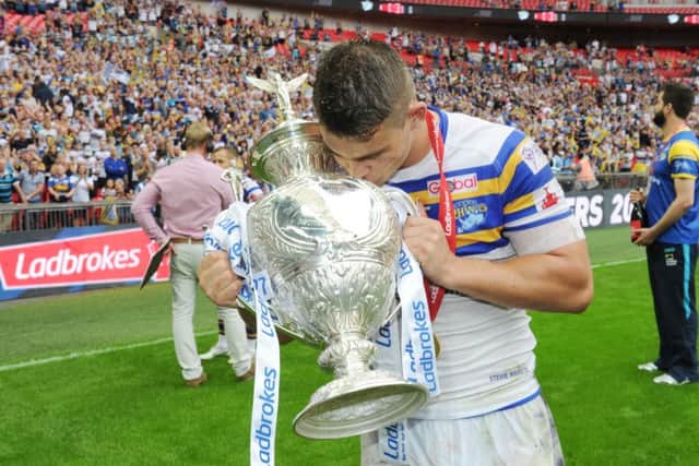 Stevie Ward kisses the Challenge Cup trophy at Wembley last year after beating Hull KR 50-0.