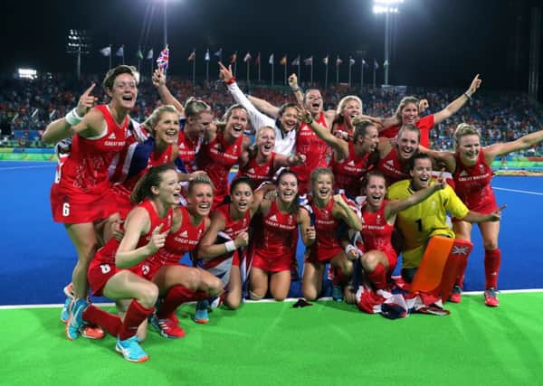 Great Britain's players celebrate their gold medal victory in the women's hockey. Picture: David Davies/PA