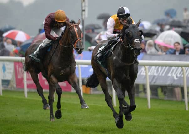 Quest For More ridden by George Baker (right) wins the Weatherbys Hamilton Lonsdale Cup during day three of the  Ebor Festival at York. Picture: Anna Gowthorpe/PA