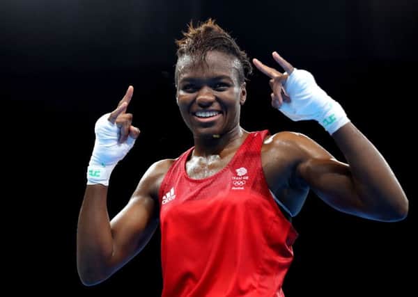 Boxer and role model Nicola Adams defended her Olympic title.