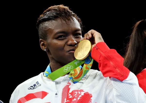 Great Britain's Nicola Adams with her gold medal