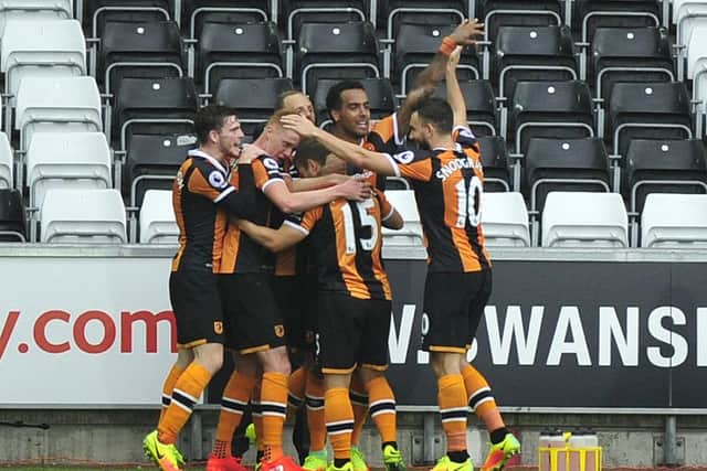 Shaun Maloney celebrates scoring against Swansea City with his Hull City team-mates (Picture: Simon Galloway/PA Wire).