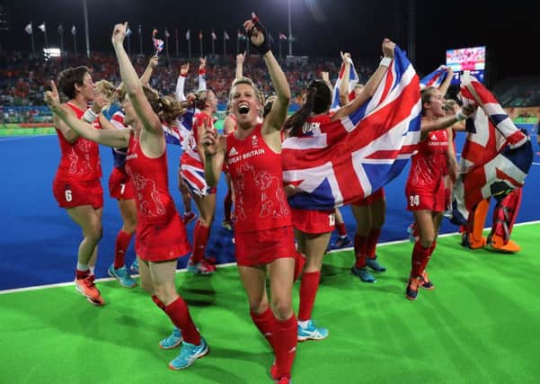 Great Britain players celebrate victory over Holland following the gold medal match at the Olympic Hockey Centre on the Fourteenth day of the Rio Olympics Games, Brazil.