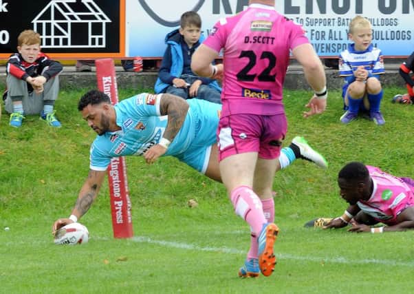 Leroy Cudjoe scores a try for Huddersfield Giants. Picture: Steve Riding.