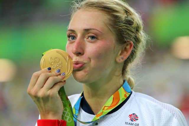 Great Britain's Laura Trott kisses her gold medal after winning the Women's Omnium. (Picture: PA)