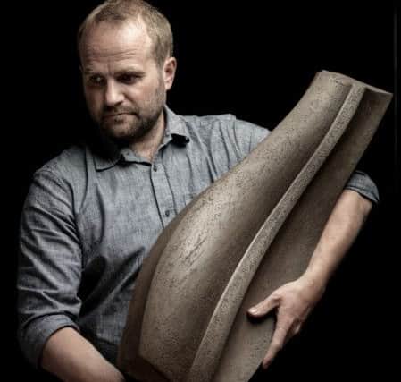 James Oughtibridge of Holmfirth with one of his pots. Picture by Cristian Barnett  courtesy of Ceramic Review magazine