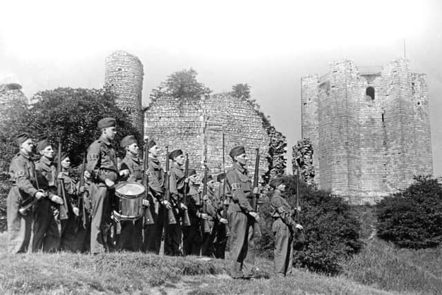 Peter Tuffrey collection..Conisborough Castle Home Guard on Parade 6 August 1940