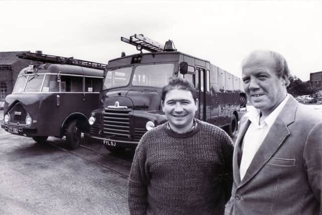 Chris Shaw (left) and Ken Warnes with a Dennis fire tender (left) and a Green Goddess at Killamarsh Heritage Centre, South Yorkshire, August 1987.