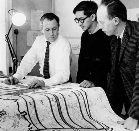 Bill Berrett (left) working on the original plans for Milton Keynes in the 1960s.