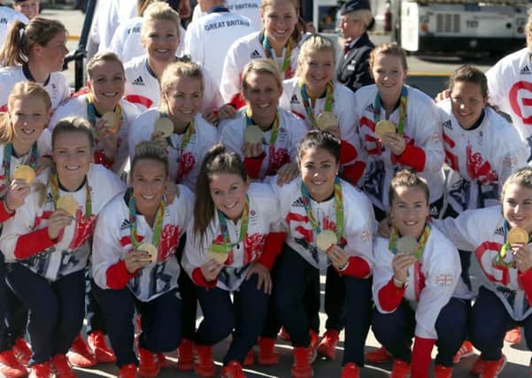 Great Britain's gold medal-winning women's hockey team at Heathrow Terminal 5.