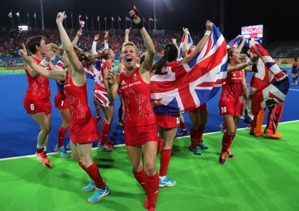 Great Britain players celebrate victory over Holland