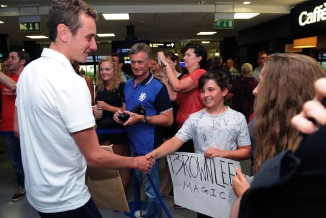 A young fan greets Great Britain's Alistair Brownlee after arriving at Leeds Bradford International Airport.

 Picture: Jonathan Gawthorpe