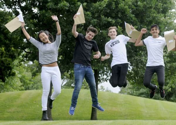 Pupils celebrate GCSE results  - does there need to be a leap of faith in education policy?