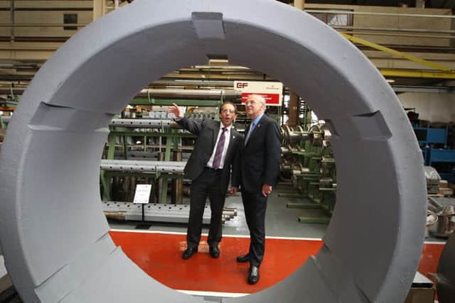 Business secretary Vince Cable visiting Group Rhodes and managing director Mark Ridgway.