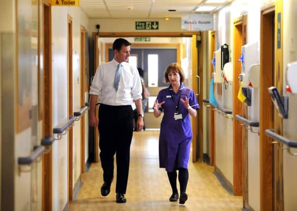 Health Secretary Jeremy Hunt visiting a hospital ward.  (PA).