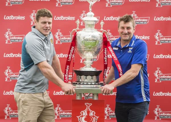 Hull FC head coach Lee Radford (left) and Warrington Wolves head coach Tony Smith ahead of the Challenge Cup final on Saturday (Picture: PA).