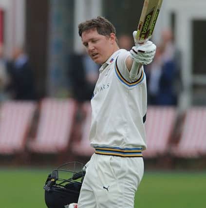 GOOD TOUCH: Stand-in captain Gary Ballance celebrates his second innings century for Yorkshire against Nottinghamshire at Scarborough on day three. Picture: Dave Williams.
