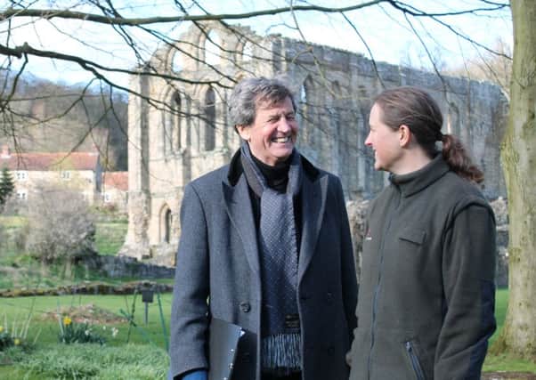 The broadcaster with Susan Harrison, from English Heritage, at Rievaulx Abbey. (picture: BBC).