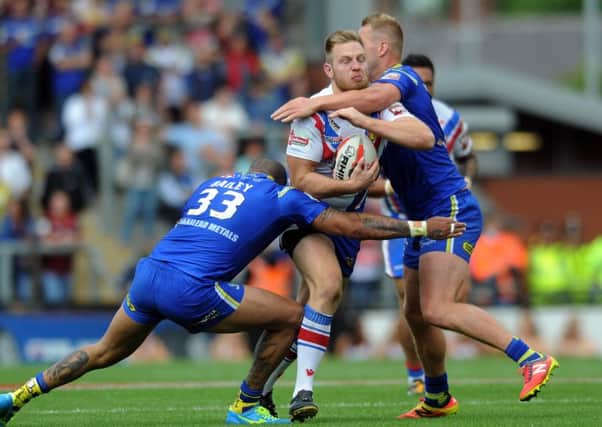 Joe Westerman, right, pictured during 
Warrington Wolves' Challenge Cup semi-final win over Wakefield Trinity (
Picture: Jonathan Gawthorpe).