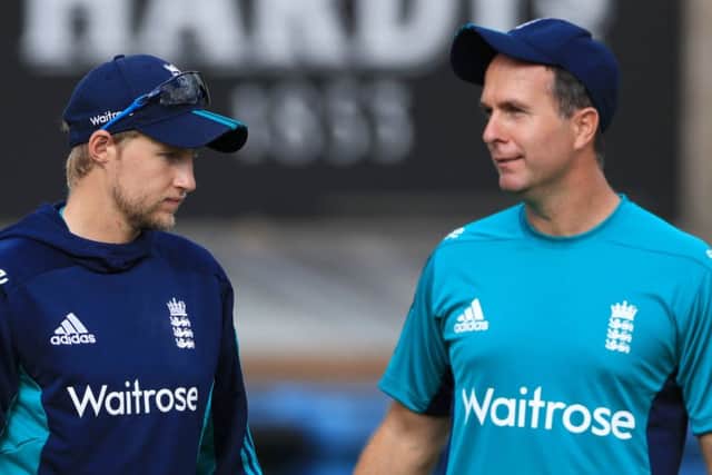 PAST AND PRESENT: England's Joe Root chats with former England captain Michael Vaughan during a nets session at Lord's. Picture: John Walton/PA.
