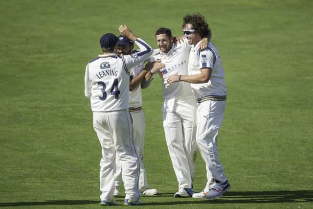 Yorkshire's Tim Bresnan is congratulated by Ryan Sidebottom and team mates on dismissing Nottinghamshire's Tom Moores. Picture by Allan McKenzie/SWpix.com