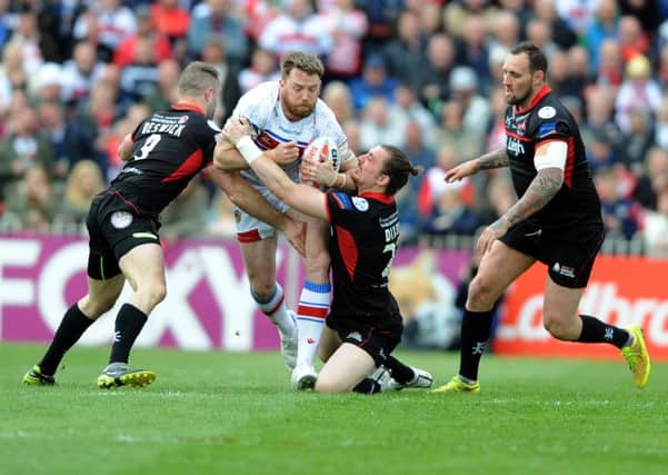 17 May 2015 .......    Wakefield Wildcats v Leigh Centurions. Challenge Cup
Wildcats Danny Kirmond fails to get through a dogged Centurion defence