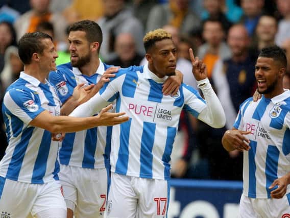 Rajiv van la Parra gives Huddersfield Town the lead over Wolves with his first goal for the Terriers. (Photo: PA)